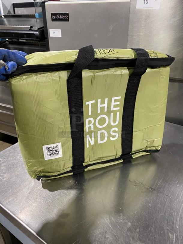 New commercial green insulated delivery bag with "THE ROUNDS" branding. Features sturdy black handles, QR code.