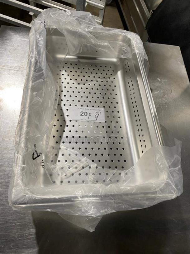 NEW Browne Commercial Stainless Steel Perforated Pan, Model 22114, in packaging, shown on metal surface.