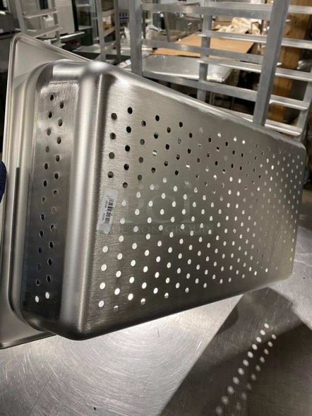 New Browne stainless steel perforated hotel pan, model 22114, in pristine condition, with visible product label.