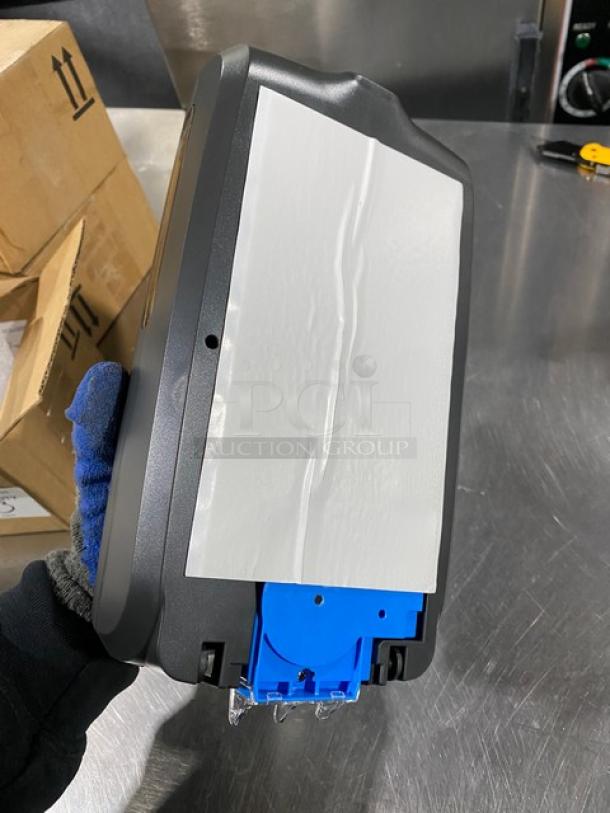 NEW Ecolab Nexa Series Black Touch-Free Hand Hygiene Dispenser, wall-mounted, sleek design, brand new condition.