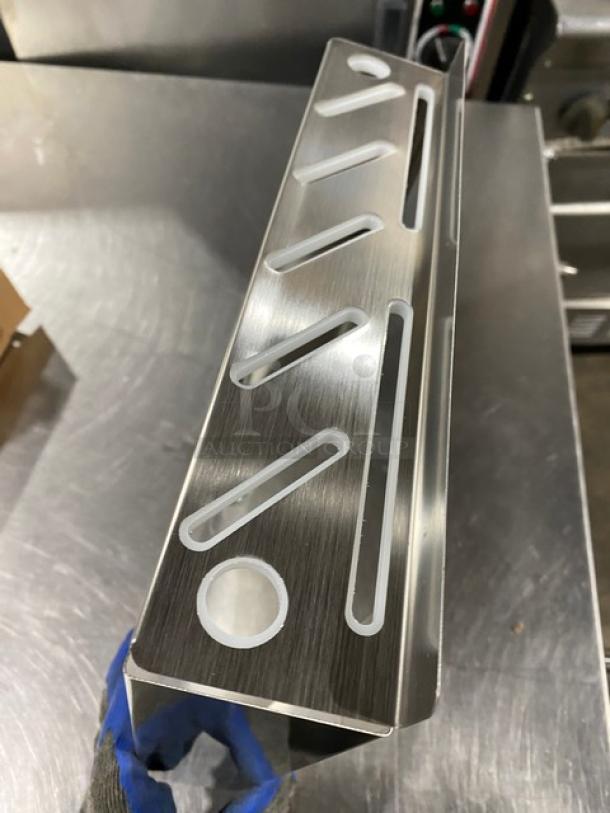 NEW Thunder Group SLKR012 stainless steel knife rack, commercial grade, sleek design, robust, pristine condition.