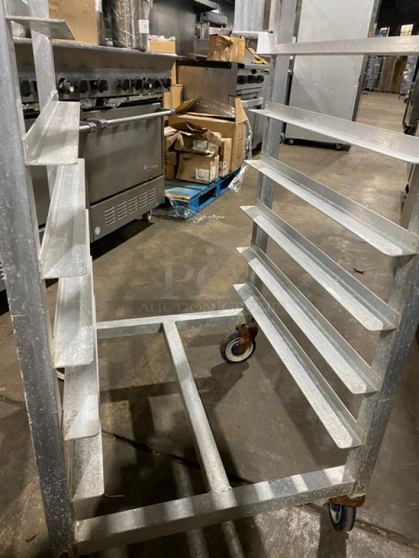 Alexander Industries stainless steel steam rack on casters, commercial-grade, durable construction, good condition.