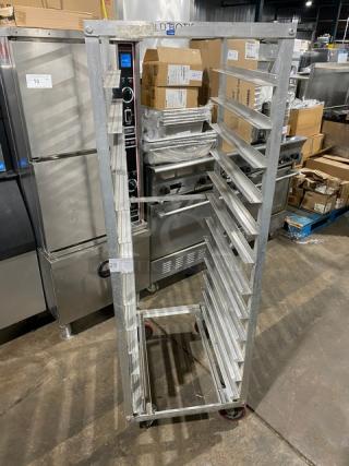 Commercial stainless steel hot food steam rack with multiple shelves on casters. Used condition. Ideal for high-capacity kitchens.