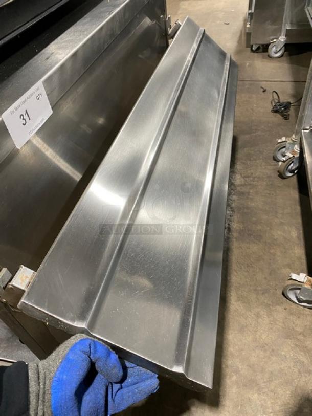 Commercial stainless steel hood panel, reflective finish, durable build, gently used condition, ideal for industrial kitchens.