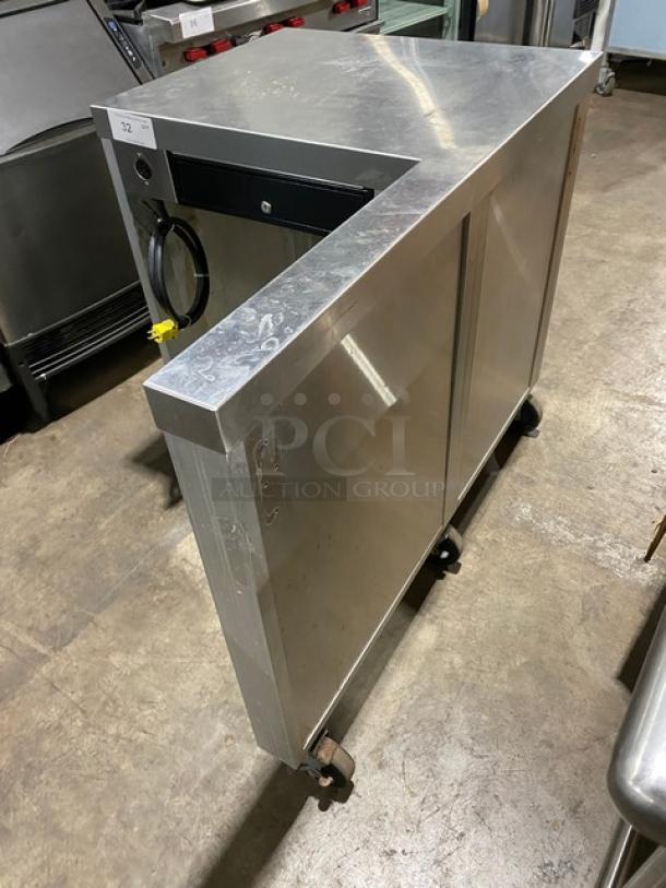 Servolift stainless steel refrigerated cold well merchandiser, Model 503-1R, SN: 03/03-223824-2, 120V, on casters, good condition.
