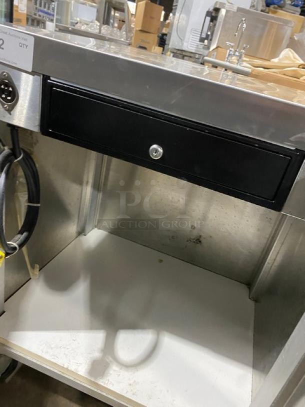 Servolift Model 503-1R stainless steel refrigerated cold well merchandiser, electric-powered, 120V, on casters, drawer visible.