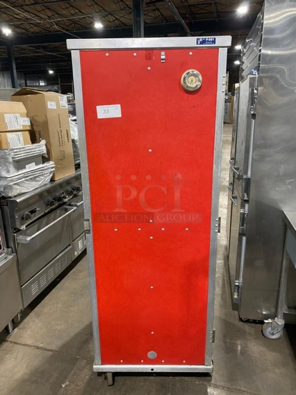 Cres-Cor heated holding cabinet, model 131-UA-11, with solid red door, pan racks, on casters, 120V 1 Phase, in good condition.