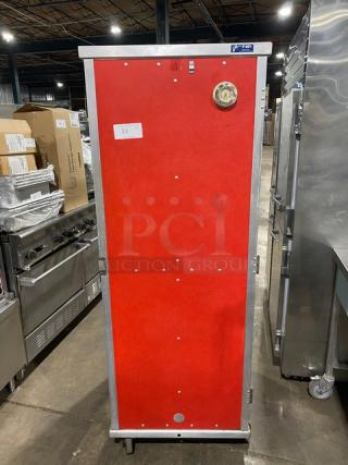 Cres-Cor heated holding cabinet, model 131-UA-11, with solid red door, pan racks, on casters, 120V 1 Phase, in good condition.