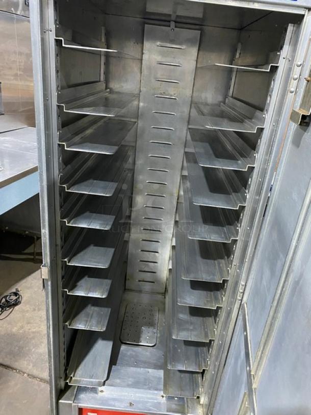 Cres-Cor 131-UA-11 stainless steel heated holding cabinet with pan racks, electric, full height, on casters, for auction.