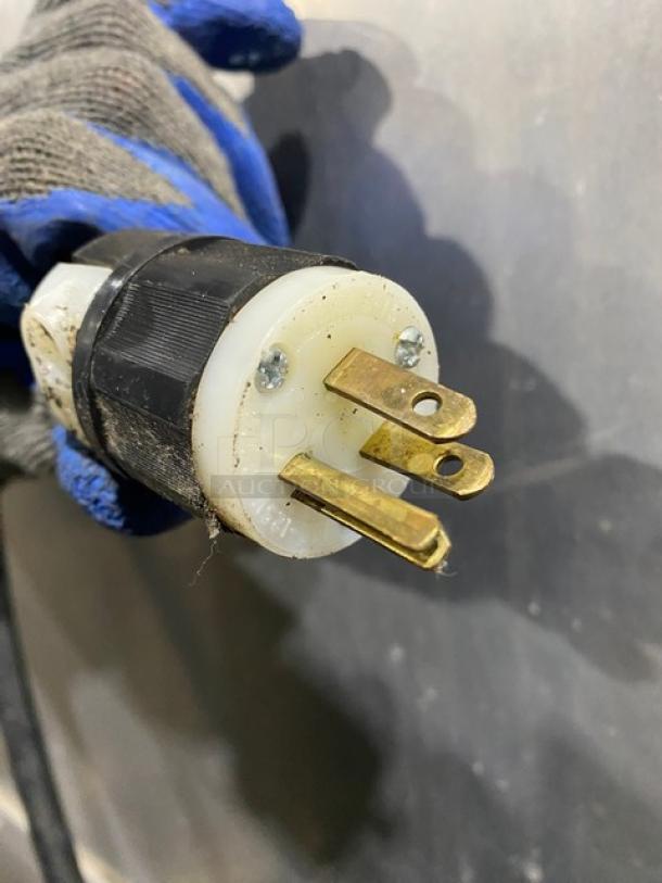 Close-up of the plug for a Cres-Cor Model 131-UA-11 heated holding cabinet, showing a 120V single-phase connector.