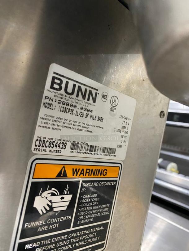 Bunn CDBCP35 Commercial Coffee Brewer with 2 top warmers, stainless steel, model and serial tags visible, 120/240V.