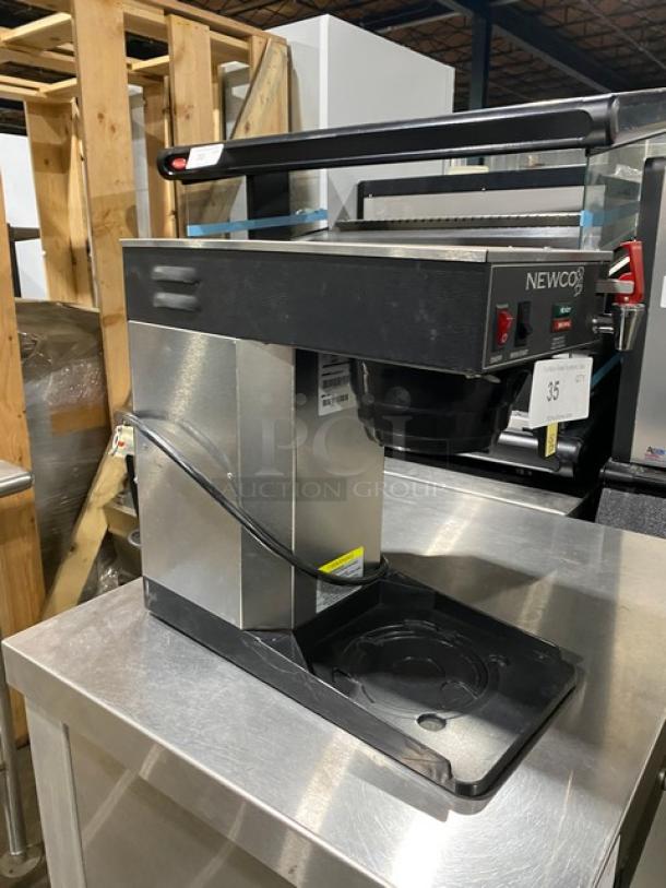 Newco ACE-TC commercial stainless steel coffee brewer with hot water dispenser. Model ACE-TC, SN A00230010, 120V, excellent condition.