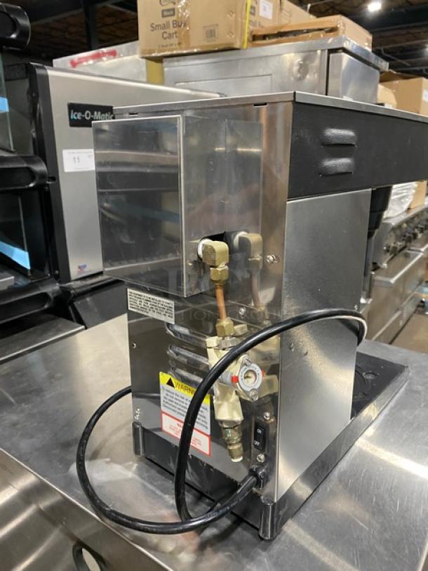 Newco ACE-TC stainless steel coffee brewer with hot water dispenser, model ACE-TC, 120V, 1 Phase. Excellent condition.