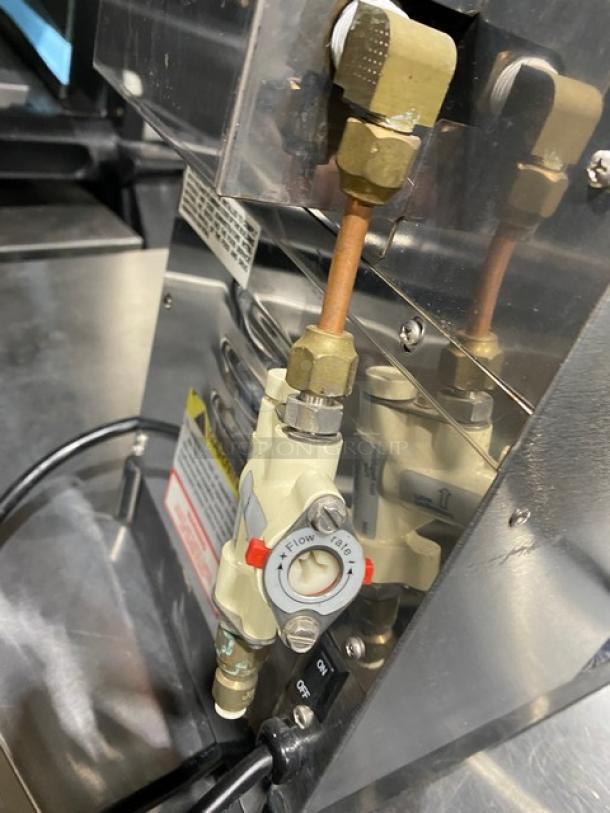 Newco ACE-TC commercial coffee brewer, stainless steel, electric, with hot water dispenser. Visible flow rate valve. Model: ACE-TC, SN: A00230010.