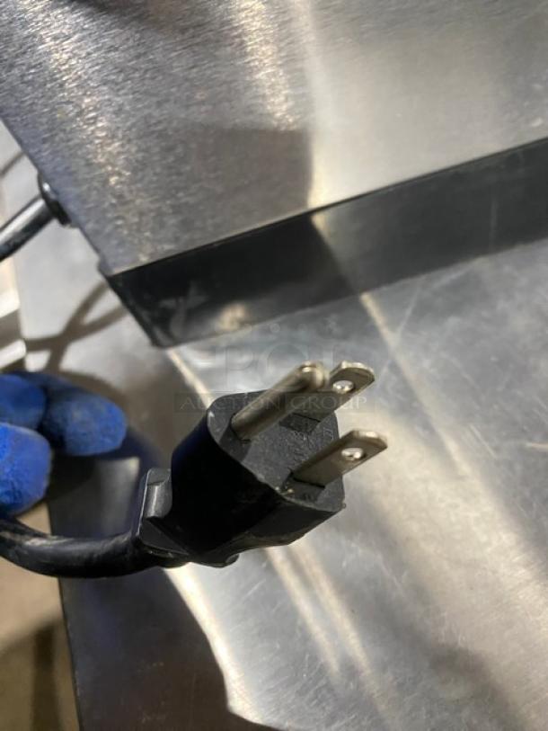 Newco ACE-TC stainless steel coffee brewer with hot water dispenser. Model ACE-TC, SN: A00230010, 120V, 1-phase plug.