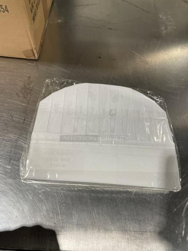 Landau Uniforms white non-woven 9" round chef hat, new in packaging, pleated design, ideal for commercial use.