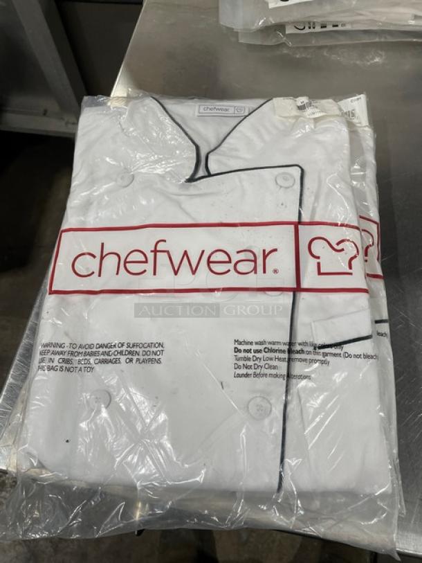 Chefwear Chef Coat CW5690CWP1, white with black piping, size M, new in packaging, marked for commercial use.