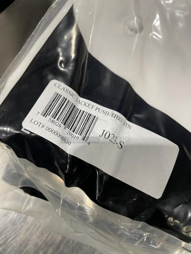 Chef Revival white chef jacket, model J023S, small size, new condition, with push-thru button. Packaging shows barcode and label.