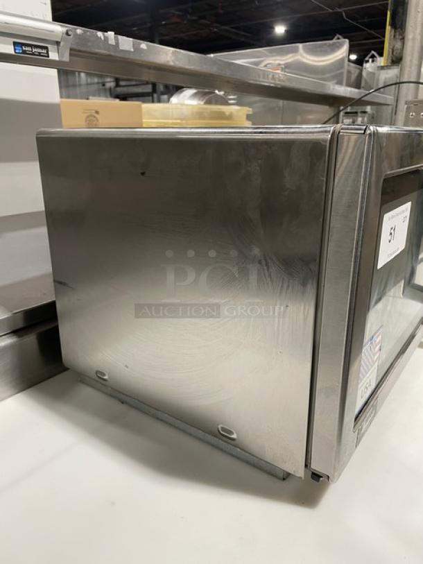 Amana 2021 commercial stainless steel countertop microwave oven, model RCS10TS, with digital push control, excellent condition.