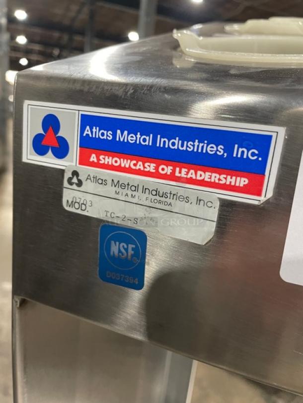 Atlas Metal Commercial Stainless Steel Tray & Silver Cart, Model TC-2-S, with NSF certification and company labels.