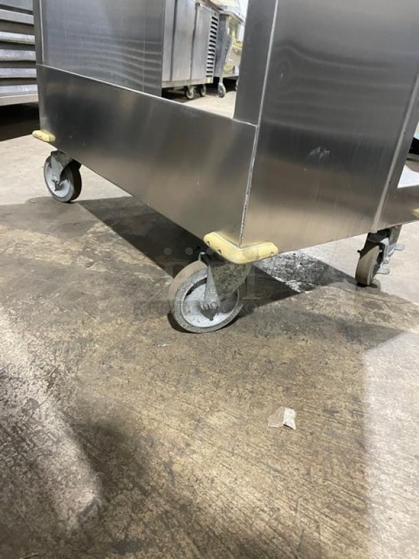 Atlas Metal TC-2-S stainless steel open style tray and silver cart on casters; durable condition shown.