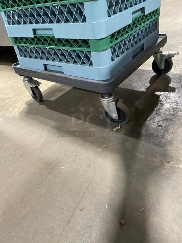 Noble commercial blue 36-compartment cup rack with green extender and dish dolly, on casters, in good condition.
