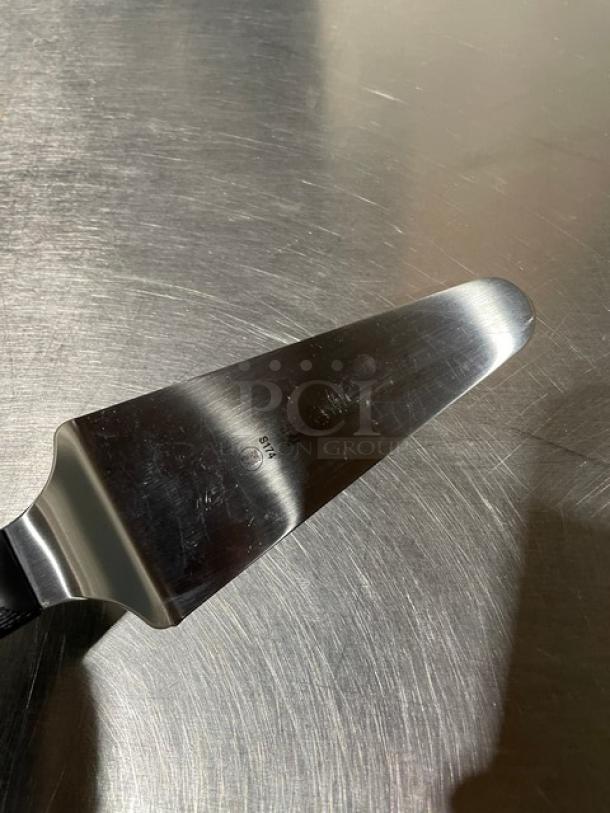 Dexter Russell Sani-Safe pie knife, model S174, stainless steel, 4.5"x2.25", black grip handle, new condition.