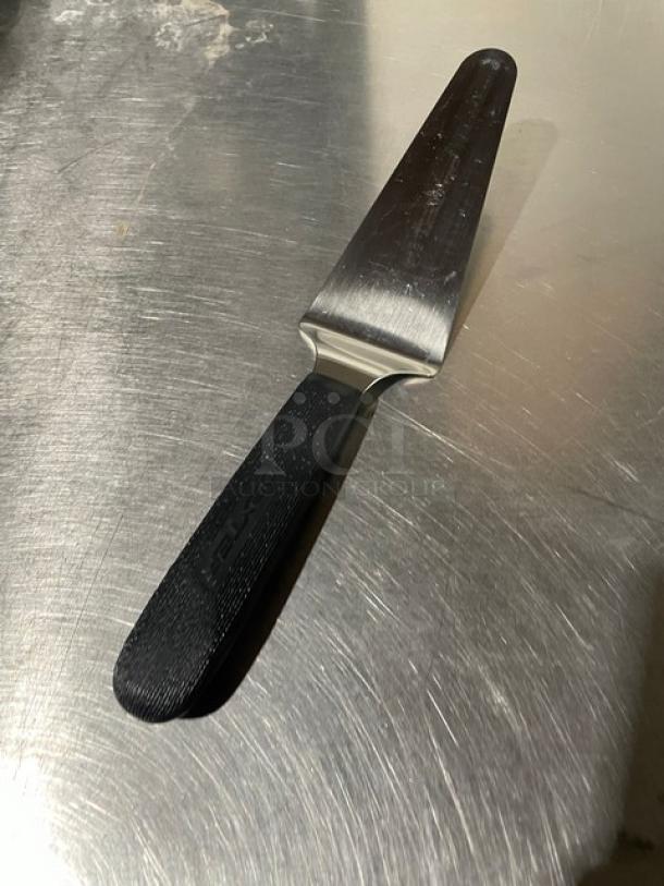 Dexter Russell Sani-Safe Series pie knife, model S174, stainless steel blade, black grip handle, new condition.