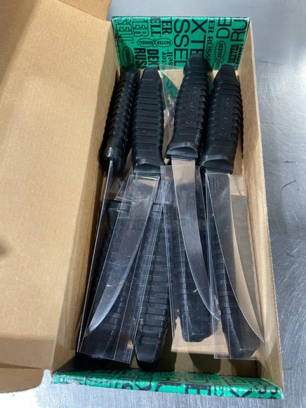 Set of new Dexter Russell Prodex Series 6" curved super-flex boning knives, model PDBH131SF-6, with black grip handles.