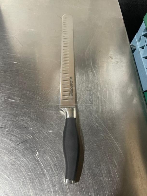 Dexter Russell I-Cut Pro Series 12" slicing knife, Model 30409, stainless steel duo-edge blade, black grip handle, new condition.