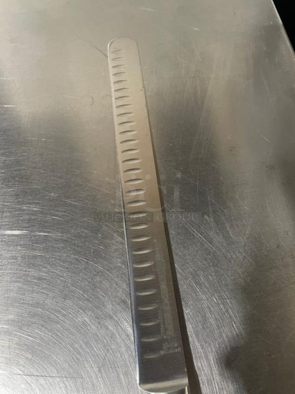 Dexter Russell I-Cut Pro 12" slicing knife, model 30409, duo-edge blade, black grip handle, stainless steel, new condition.