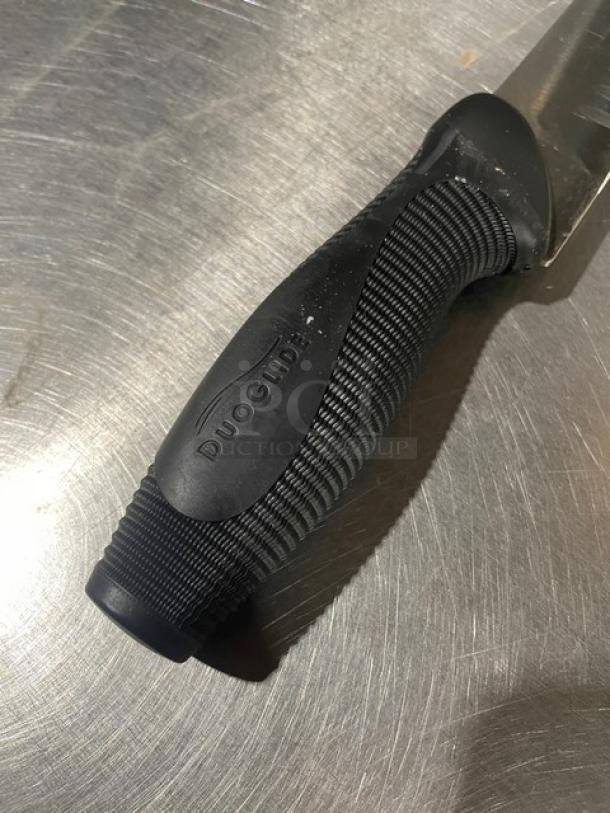 Dexter Russell DuoGlide slicer knife, stainless steel blade, black grip handle, DuoGlide logo visible, new condition.