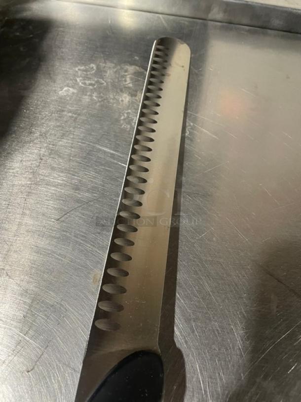 Dexter Russell DuoGlide stainless steel duo-edge slicer knife with black grip handle, new condition.