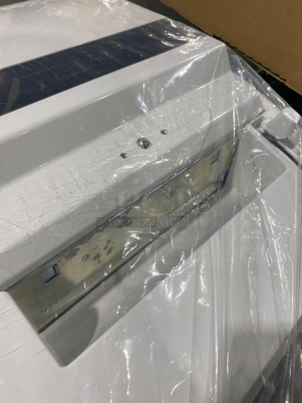 Kimberly-Clark roll towel dispenser, model 0971700, new condition, wrapped in plastic, white finish.