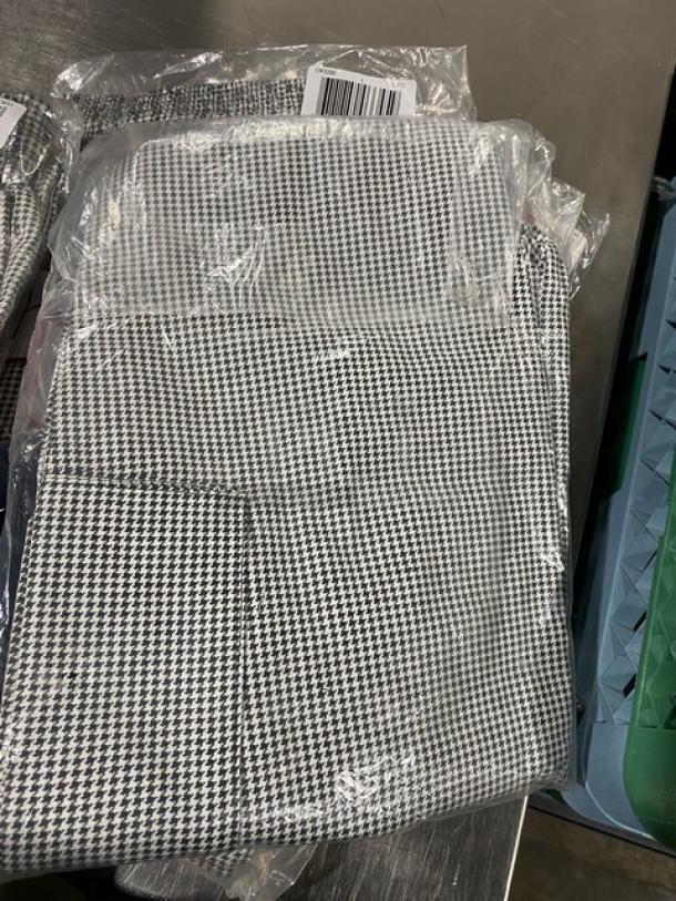 New Chefwear black & white chef pants, size L, model CW3200-CW11. Sealed in original packaging, excellent condition.