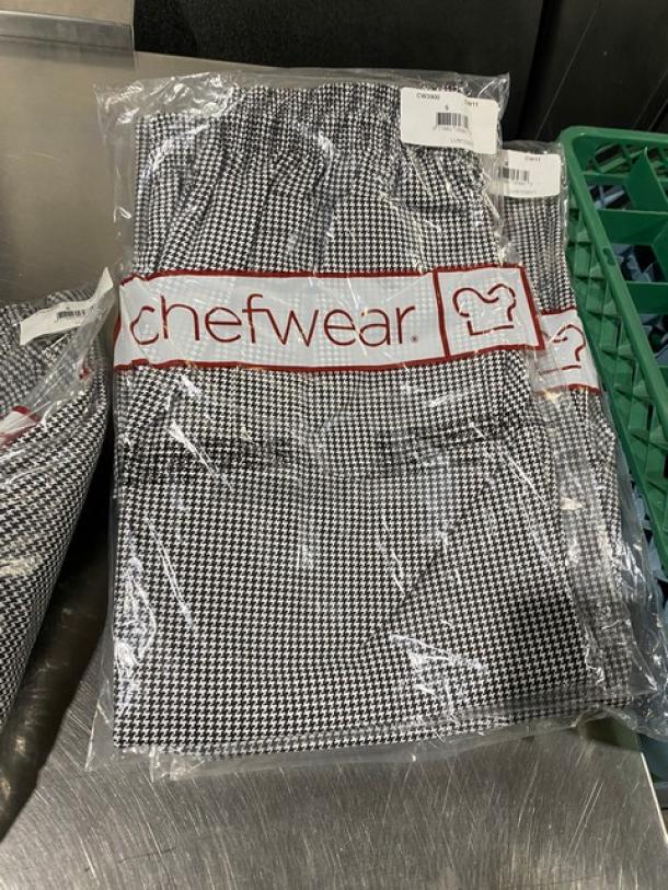 Chefwear black & white chef pants, model CW3900CW11, size S. New in packaging with brand label.