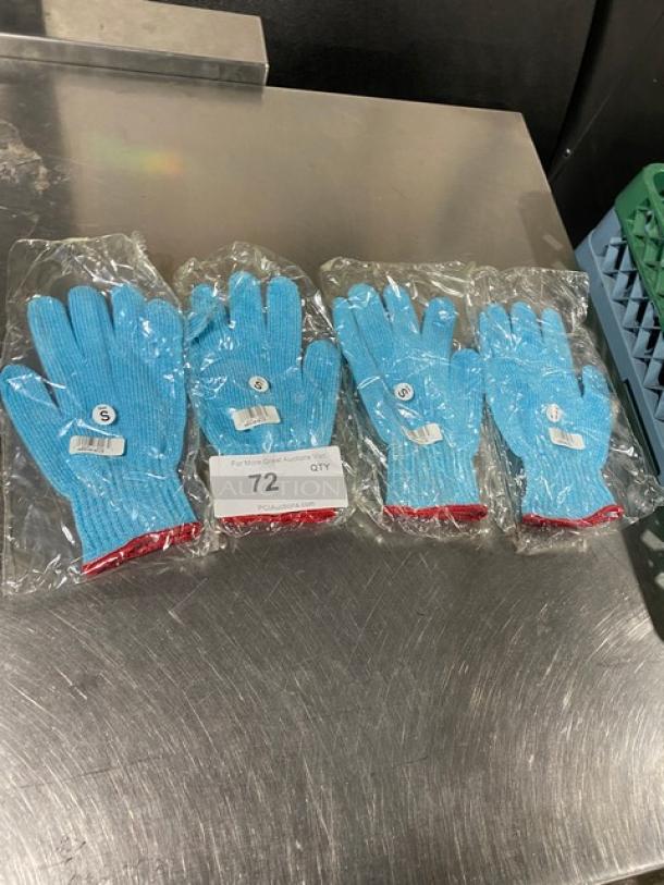 Four pairs of new commercial blue gloves, small size, model SSG-3S, in plastic packaging, labeled "S" and "72 QTY."