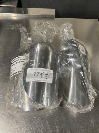 Three new commercial stainless steel 85 oz round ice scoops in plastic wrap, showing auction tags with quantity and item info.