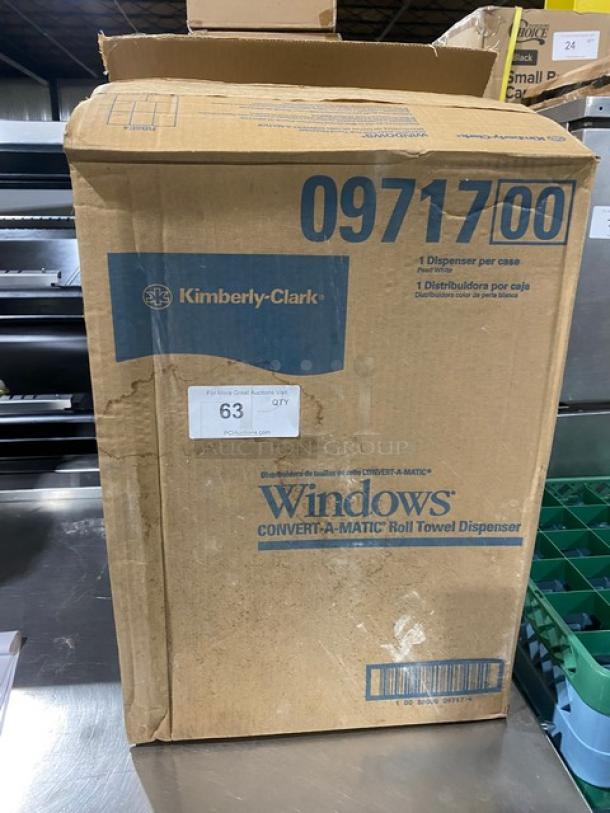 Kimberly-Clark roll towel dispenser, model 0971700, new in original packaging. Box labeled "Convert-A-Matic."