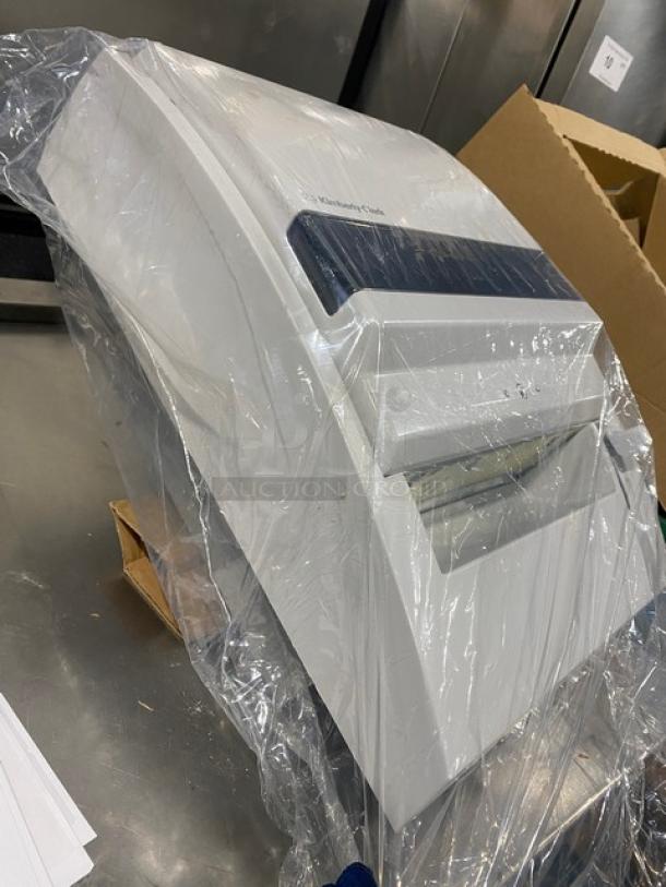 Kimberly-Clark roll towel dispenser, model 0971700, new in packaging, white plastic exterior.