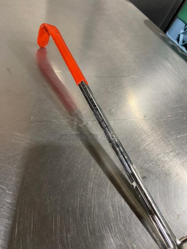 Polar Ware 4 oz stainless steel ladle, new, with red handle and visible packaging. Ideal for commercial use.