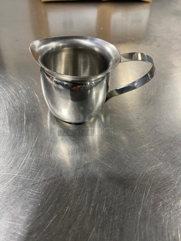 NEW ABC Stainless Steel 3 Oz Bell Creamer, Model BCR-3, in excellent condition with a sleek handle design.