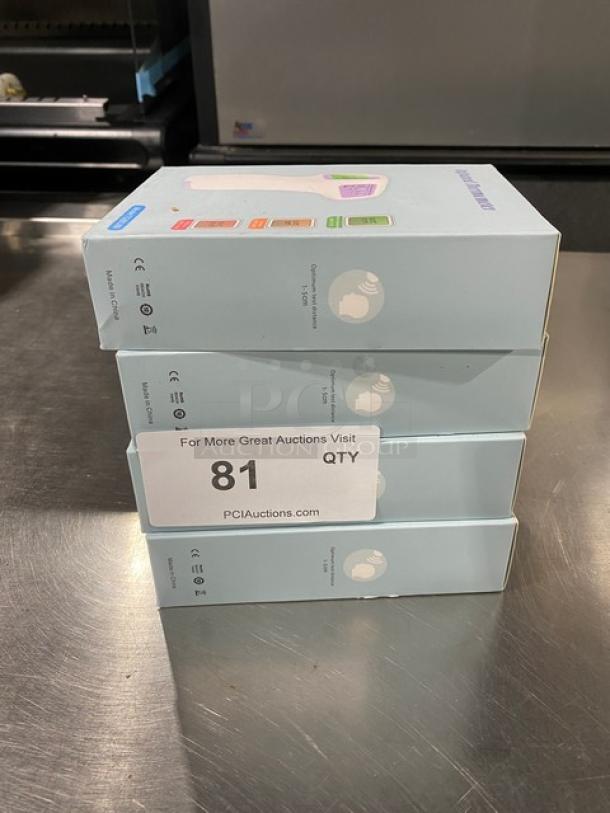 Stack of new Commercial Infrared Non-Contact Forehead Thermometers, model TG8818N, in sealed boxes. Quantity: 4.