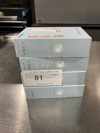 Stack of new Commercial Infrared Non-Contact Forehead Thermometers, model TG8818N, in sealed boxes. Quantity: 4.