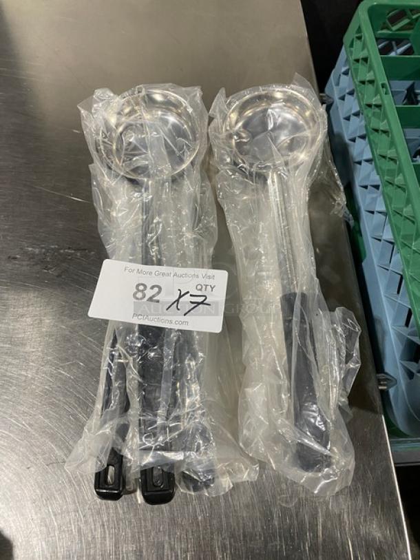 New ABC Commercial 6 Oz Stainless Steel Serving Spoon, Model PPG-6-S, with Black Grip Handle, in original packaging.