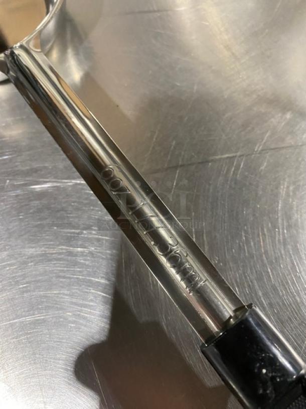 ABC PPG-6-S stainless steel 6 oz portion serving spoon with black grip handle, new condition, engraved measurements visible.