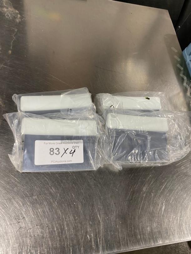 New Jimmy John's style commercial stainless steel dough cutters with white grip handles, wrapped in plastic. Quantity: 4.