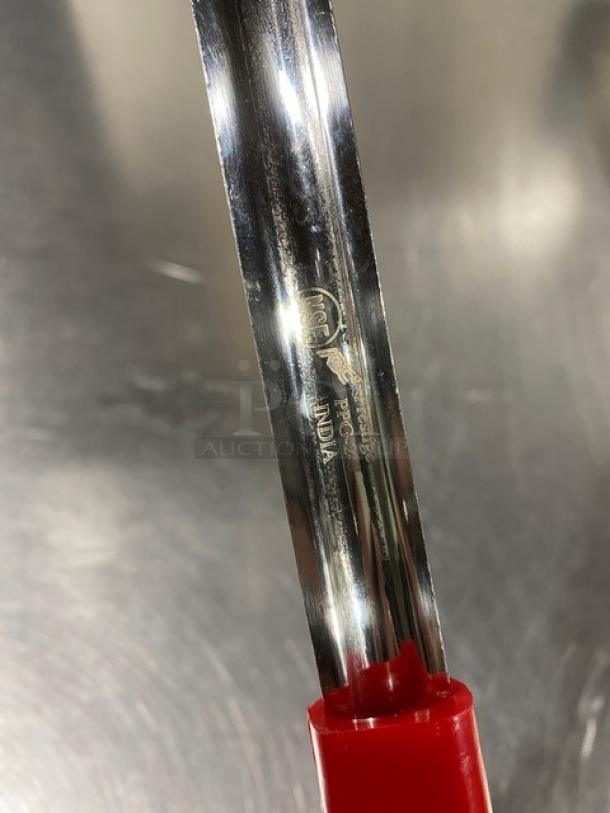 ABC Prestige Series stainless steel portion control spoon, Model PPG2S, featuring red handle, new condition.
