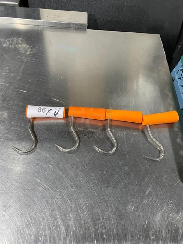 Dexter Russell Barr-Bros stainless steel boning hooks with orange grips, new condition, labeled "86" on one hook.