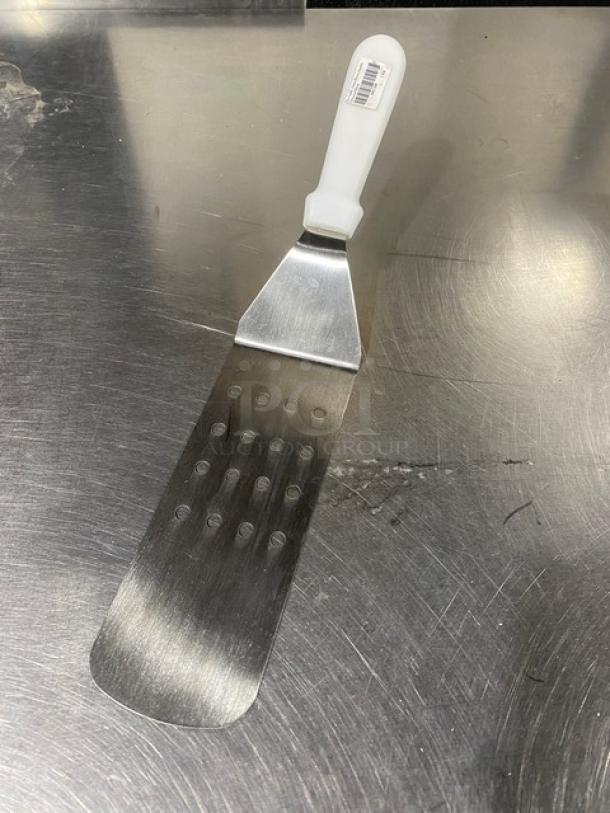 Commercial stainless steel perforated flex turner with white grip handle, Model PFT10P, new condition.